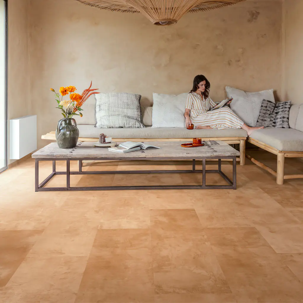 Beige stone tile effect laminate flooring in modern boho living room