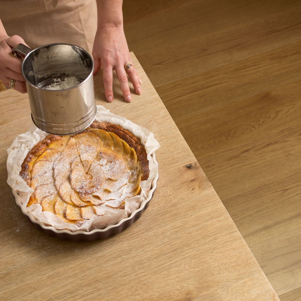 Natural pale oak engineered wood flooring in a modern kitchen