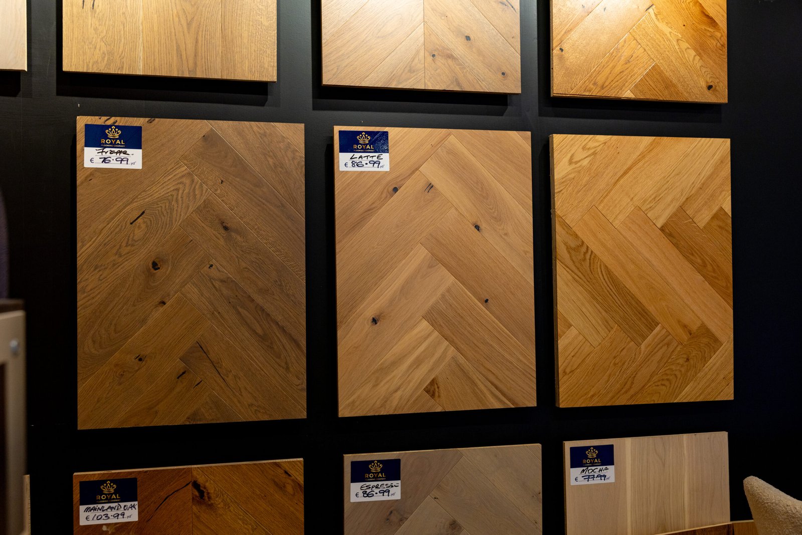 Oak herringbone parquet flooring samples Timber and Latte shades Royal Flooring showroom